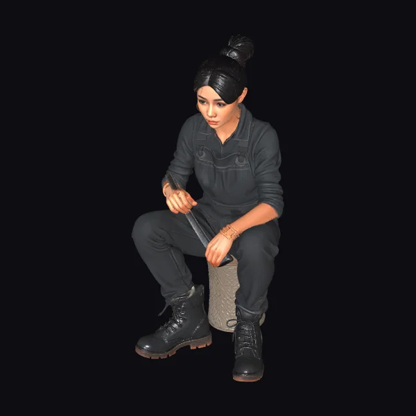 Asian Female Mechanic Sitting