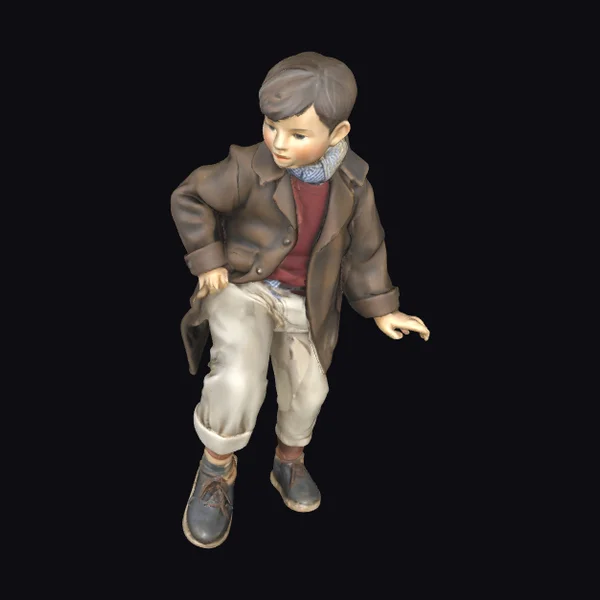 Young Boy in Winter Clothes